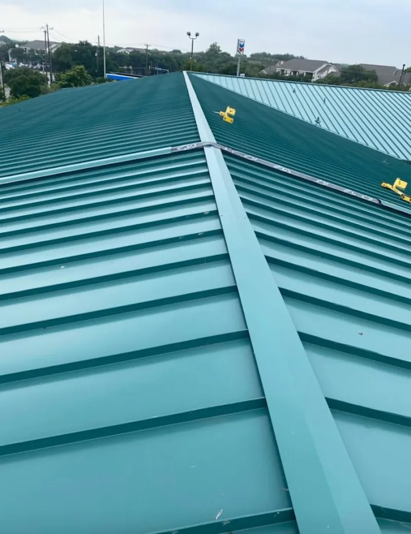 Green commercial metal roof ridge and valley for Metal Roof Repair in Kendall West
